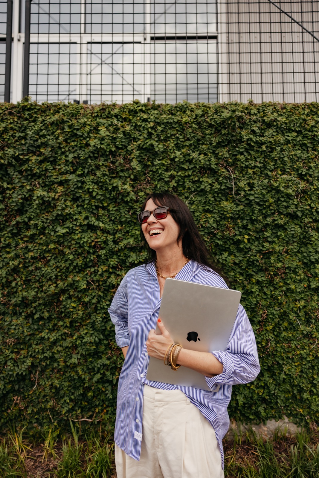 Natasha Murphy holding a laptop